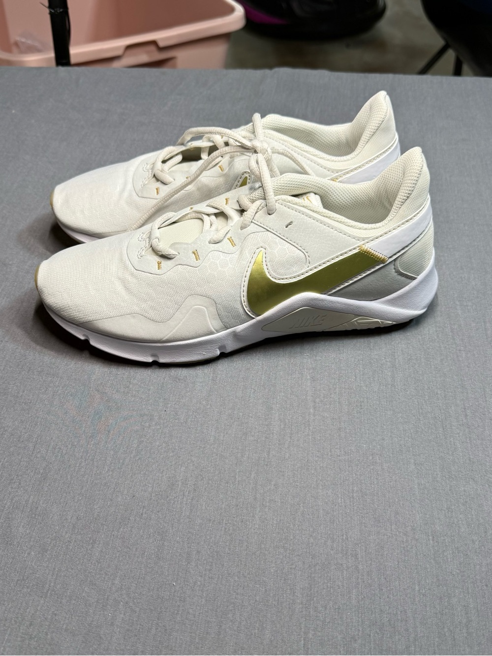 Nike Off-White Sneakers with Metallic Gold Swoosh